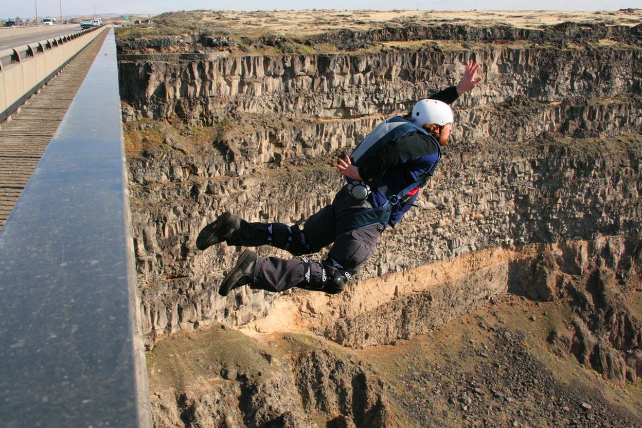 A BASE jumper leaping from the Perrine Bridge in Idaho
