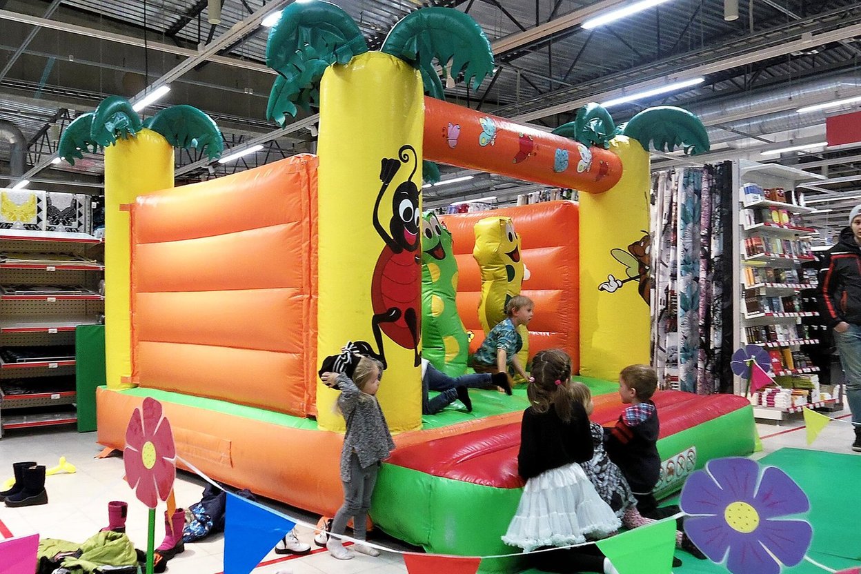An inflatable bounce house set up at a party